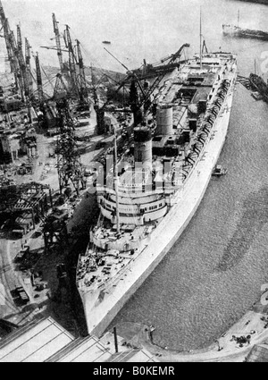 The ocean liner RMS 'Queen Mary', Clydebank, Glasgow, 1934 (1935).Artist: John Brown & Company Stock Photo