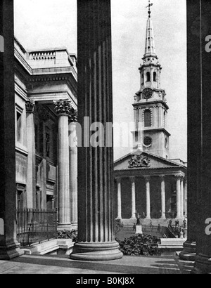 St Martin-in-the-Fields seen between the columns of the National Gallery, London, 1926-1927.Artist: McLeish Stock Photo