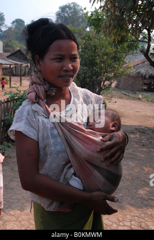 wah minority lady is looking after her babe, thai bermese border, maehongson, north of thailand Stock Photo