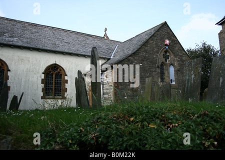 Front of St Mary the Virgin Parish Church, Lynton, Devon showing Church Window, Entrance and Graveyard Stock Photo