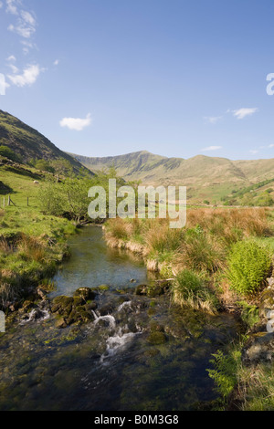 Afon Dwyfor river in rural Welsh valley with mountains in Snowdonia 'National Park' Cwm Pennant Gwynedd North Wales UK Stock Photo