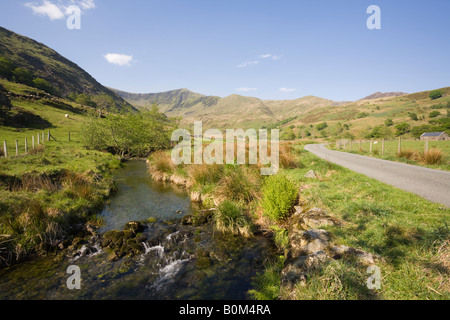 Afon Dwyfor river in rural Welsh valley with mountains in Snowdonia 'National Park' Cwm Pennant Gwynedd North Wales UK Stock Photo