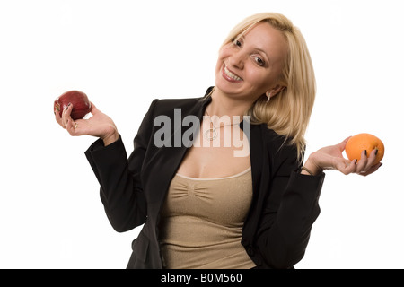 Comparing apples and oranges Stock Photo