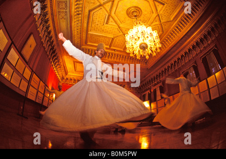 TURKEY ISTANBUL Whirling Dervishes dancing and performing at Yildiz Palace Stock Photo
