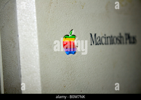 Apple logo on a dirty Macintosh Plus personal computer. Stock Photo