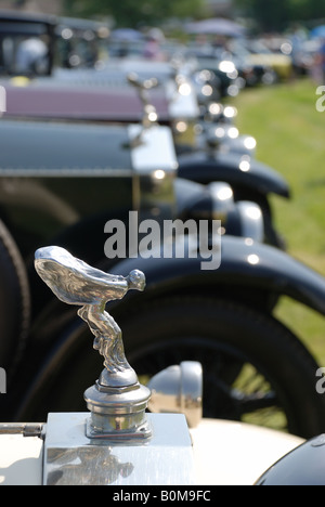 Spirit of ecstasy in a row of vintage Rolls Royce motor cars Stock Photo