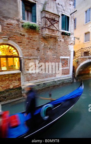 Gondola on a canal in Venice Stock Photo