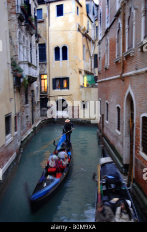 Gondolas on a canal in Venice Stock Photo