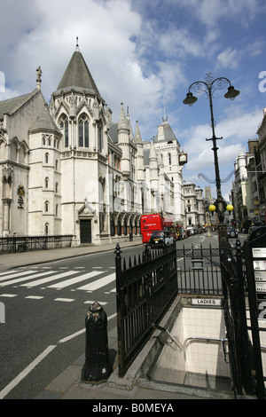 City of London, England. A public convenience located on Fleet Street with the Royal Courts of Justice in the background. Stock Photo