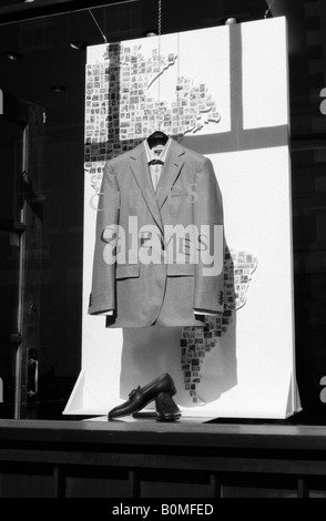 a suit in the window of Gieves and Hawkes in Savile Row London Stock Photo