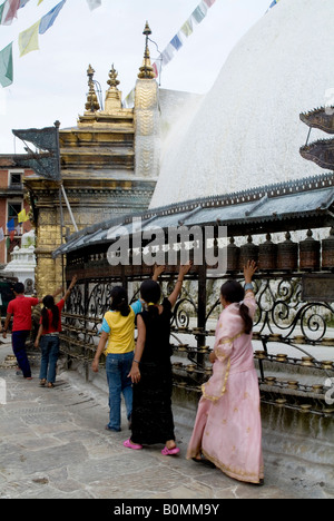 Turning the temple bells, Swayambhunath (Monkey Temple), Kathmandu, Nepal. Stock Photo