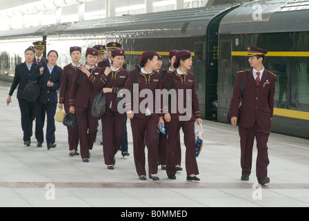 Train staff getting off the Lhasa- Beijing new railway link in Lhasa, Tibet. Stock Photo