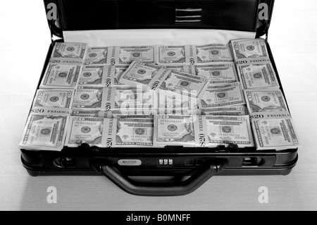 a briefcase full of American Dollars money Stock Photo