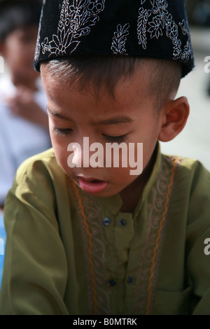 young muslim boy at mosque koh samui thailand Stock Photo