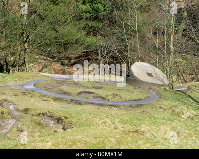 The old crushing wheel, of the the abandoned Odin lead mine, at the foot of Treak Cliff hill, Castleton, Derbyshire, England. UK Stock Photo