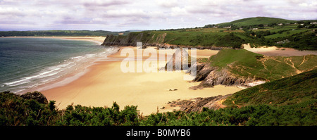 This is a colour panorama of three cliffs bay on the Gower Peninsula in Swansea. It is taken looking towards oxwich and tor Stock Photo