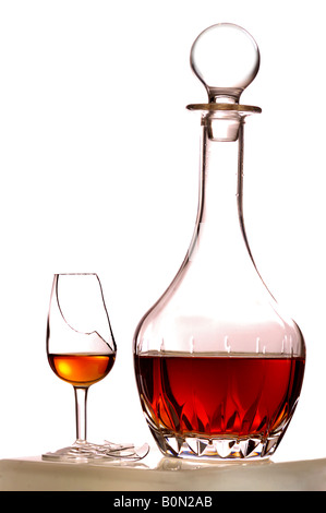 Sherry decanter and broken glass Stock Photo