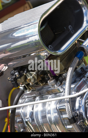 Highly polished chrome engine block and air filter from a hotrod Stock Photo