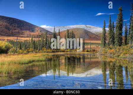 Dempster Highway, it begins in Dawson City, crosses the Arctic Circle and ends at the Beaufort Sea. Stock Photo