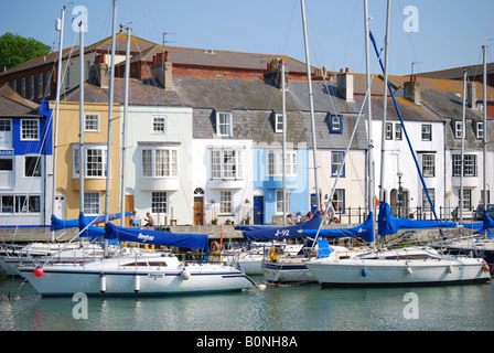Colourful houses on quayside, Weymouth Harbour, Weymouth, Dorset, England, United Kingdom Stock Photo