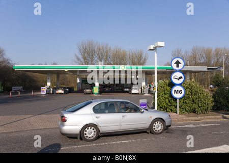 Car passing the BP fuel station at Hilton Park M6 North Bound (northbound) motorway service station. Stock Photo