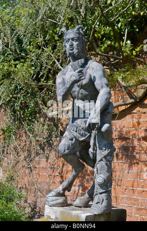 Statue of the Greek god Pan at Painswick Rococo garden Stock Photo