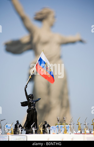 Souvenir and actual Motherland Calling statue on summit of Mamayev Kurgan, Volgograd (formerly Stalingrad), Russia Stock Photo