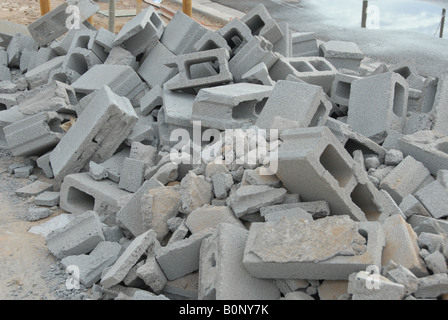 A pile of grey cement bricks. Stock Photo