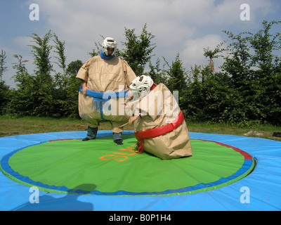 students sumo wrestling at school camp Stock Photo