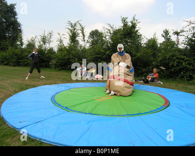 students sumo wrestling at school camp Stock Photo