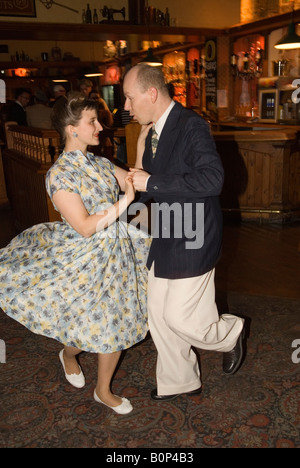 Retro couple UK dancing the jive, Pontins Holiday Camp, Camber Sands Sussex England. Rhythm Riot Retro Weekend 2000s 2007 HOMER SYKES Stock Photo