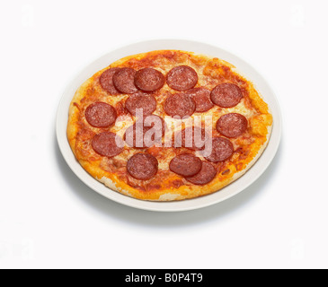 thin crust pizza with extra pepperoni Stock Photo