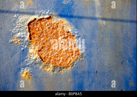 Close up of rusting blue metal sheet Stock Photo