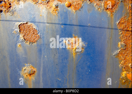 Close up of rusting blue metal sheet Stock Photo