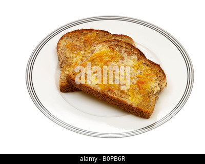 Fresh Sweet Wholemeal Toast With Marmalade Isolated Against A White Background With A Clipping Path And No People Stock Photo