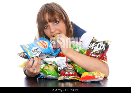 Teenage Girl Eating Crisps Model Released Stock Photo