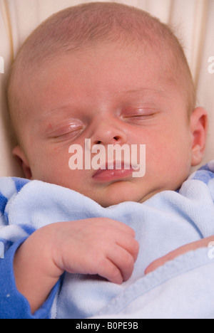 Close Up on Face of Sleeping Newborn Baby Boy Joshua Kailas Hudson Aged 20 days Stock Photo