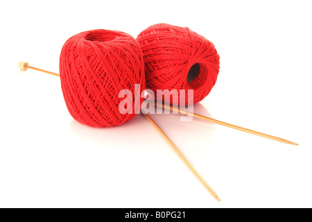 Two balls of wool with knitting needles Stock Photo