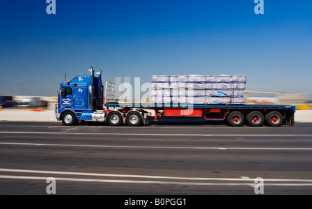 Transportation and Trucking / A Semi Trailer transporting Freight Stock Photo