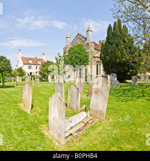 A 2 picture stitch panoramic of the graveyard and headstones at St Mary's Parish Church, Rye. Stock Photo