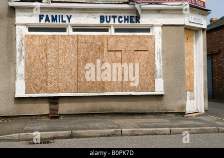 Family Butchers corner shop boarded up closed down, Sutton Bridge Lincolnshire UK 2008 2000s HOMER SYKES Stock Photo