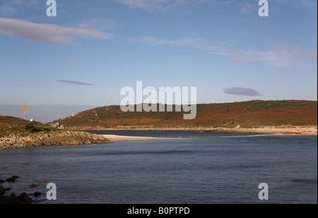 The Island of Gugh viewed from the Scilly Island of St Agnes UK is connected by a tidal causeway called The Bar Stock Photo