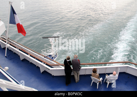 Passengers on a cross channel ferry sailing between France and the United Kingdom Stock Photo