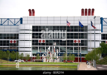 George R Brown Convention Center and sculpture named Monument au Fantome by Jean Dubuffet at Discovery Green in Houston Texas Stock Photo
