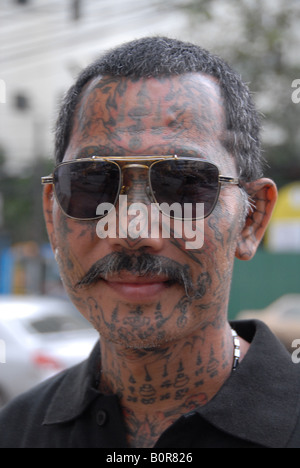 tatto face, phuket, thailand, vegetarian festival Stock Photo