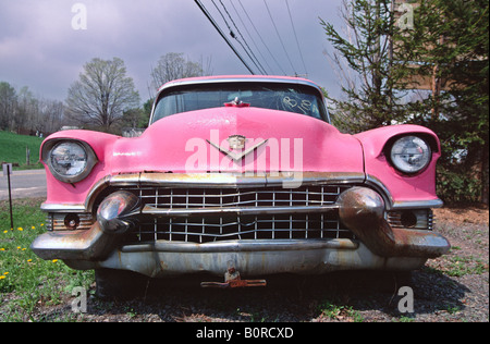 Pink Cadillac rusting by the roadside New York State USA