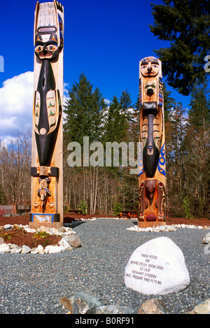 Nuu-chah-nulth Totem Poles near Port Alberni, BC, Vancouver Island, British Columbia, Canada Stock Photo