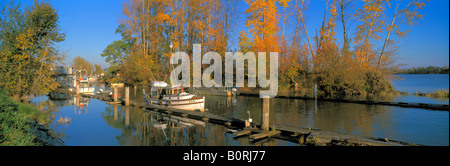 Fraser River, Richmond, BC, British Columbia, Canada - Historic Commercial Fishing Boat docked in Finn Slough, Autumn / Fall Stock Photo