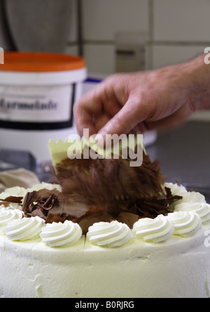 Preparation of a Black Forest Cake- Chocolate shavings Stock Photo
