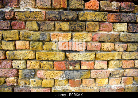 Multi coloured brick wall Stock Photo
